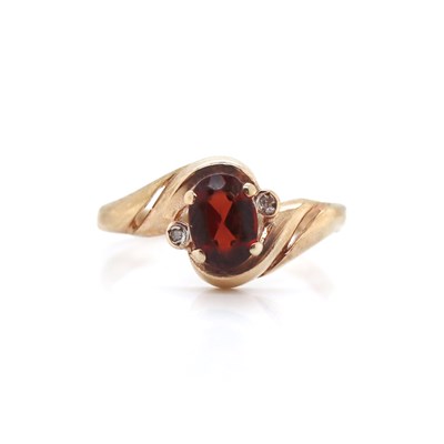 Lot 86 - 9CT Yellow Gold 0.80ct Garnet And Diamond Dress Ring