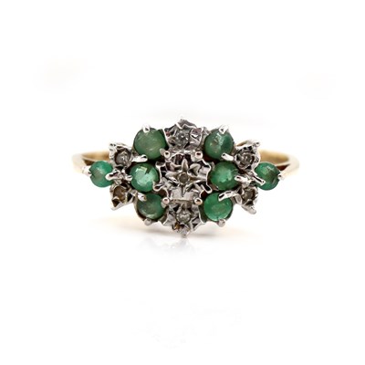 Lot 122 - 9CT yellow and white gold Emerald with Diamond dress ring